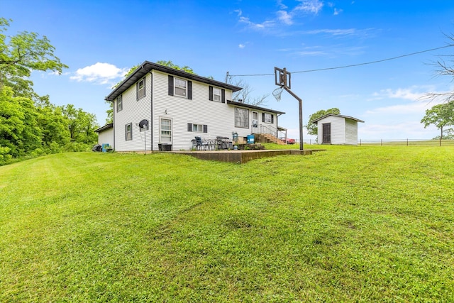 1650 Clouse Rd, Macomb, MO 65702 - rear view of property with an outbuilding