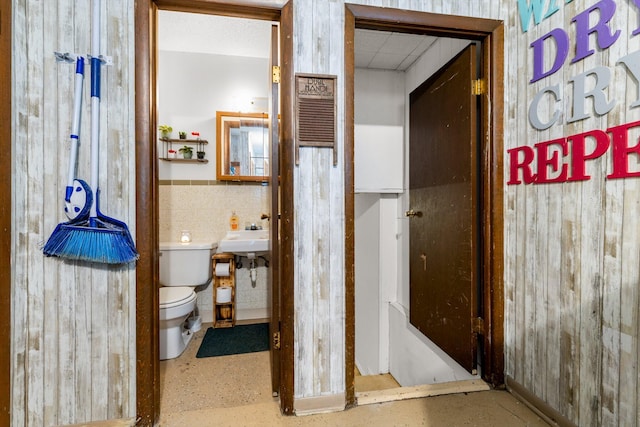 1650 Clouse Rd, Macomb, MO 65702 - half bath with toilet and tile walls