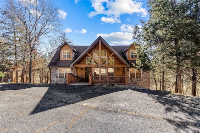 60 Mayberry Cir, Branson West, MO 65737 - chalet / cabin featuring stone siding and covered porch
