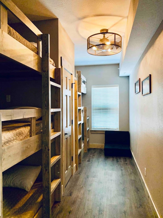240 Chateau Cove Dr, Branson, MO 65616 - bedroom with wood finished floors and baseboards