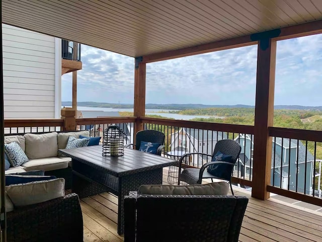 240 Chateau Cove Dr, Branson, MO 65616 - wooden deck featuring a water view and an outdoor living space