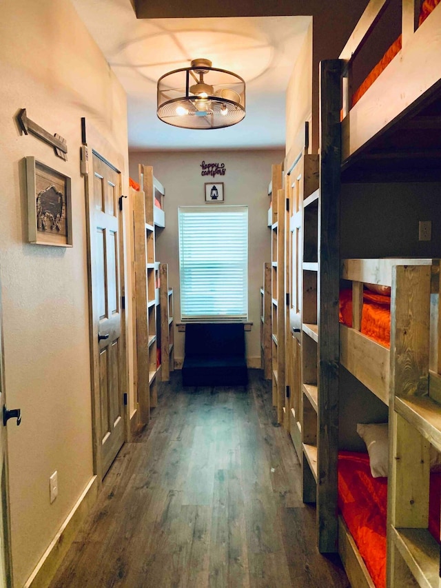 240 Chateau Cove Dr, Branson, MO 65616 - hallway with dark wood-type flooring and baseboards