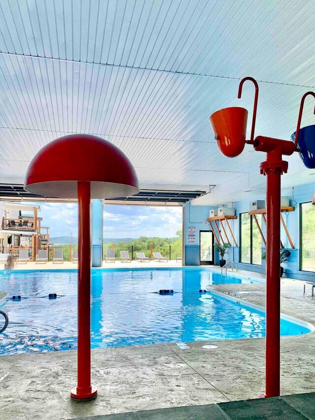 240 Chateau Cove Dr, Branson, MO 65616 - community pool with a patio area