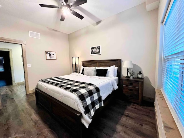 240 Chateau Cove Dr, Branson, MO 65616 - bedroom with dark wood-type flooring, ceiling fan, and baseboards