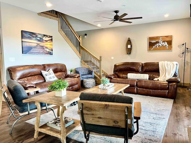 240 Chateau Cove Dr, Branson, MO 65616 - living room featuring a ceiling fan, wood finished floors, and stairway