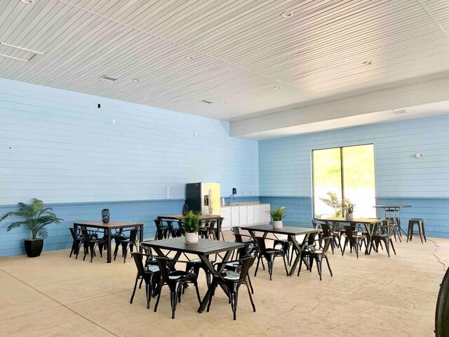240 Chateau Cove Dr, Branson, MO 65616 - view of patio with outdoor dining area and a sink