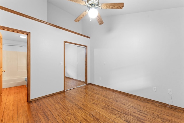 160 Village Trl, Indian Point, MO 65616 - unfurnished bedroom featuring light wood-type flooring, a closet, a ceiling fan, and baseboards