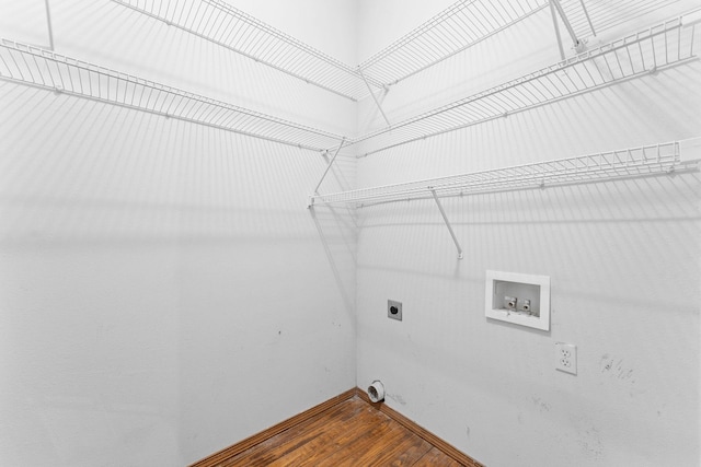 160 Village Trl, Indian Point, MO 65616 - washroom with electric dryer hookup, hookup for a washing machine, baseboards, and dark wood-style floors