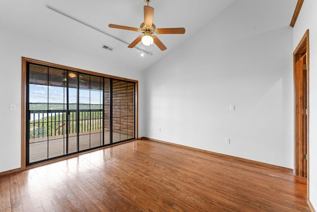 160 Village Trl, Indian Point, MO 65616 - unfurnished room with wood finished floors, ceiling fan, baseboards, and high vaulted ceiling