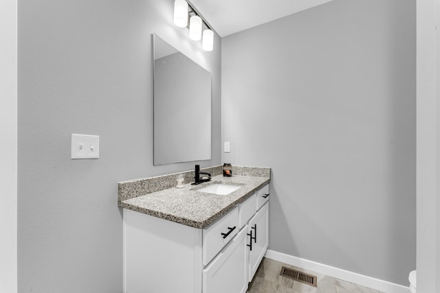 1682 Vicksburg Psge, Republic, MO 65738 - half bathroom with vanity, baseboards, and toilet