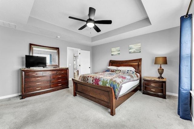 1682 Vicksburg Psge, Republic, MO 65738 - bedroom featuring a tray ceiling, light colored carpet, baseboards, and ceiling fan