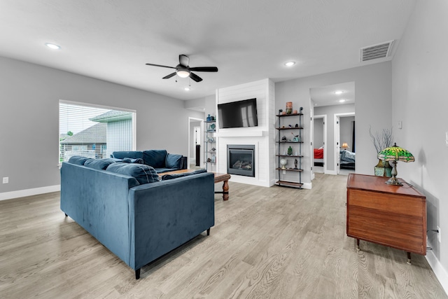 1682 Vicksburg Psge, Republic, MO 65738 - living room with a ceiling fan, baseboards, light wood-type flooring, a fireplace, and recessed lighting