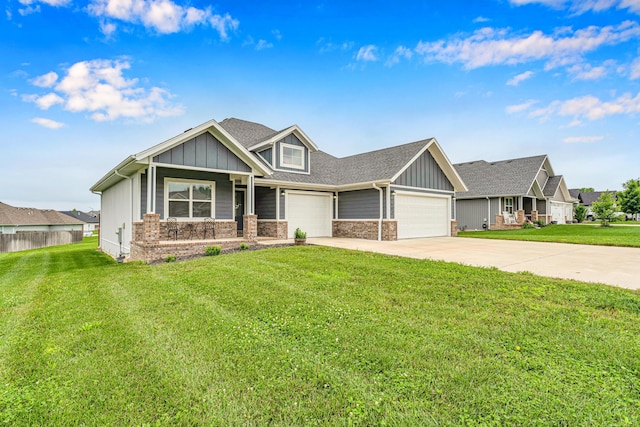 1682 Vicksburg Psge, Republic, MO 65738 - craftsman-style house featuring board and batten siding, driveway, an attached garage, and a porch