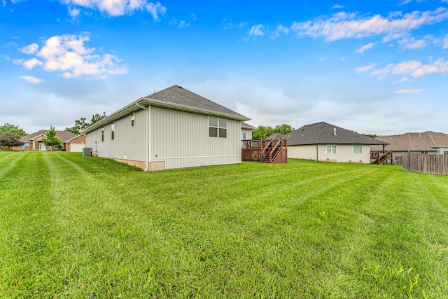 1682 Vicksburg Psge, Republic, MO 65738 - view of yard with stairway, a deck, and central AC unit