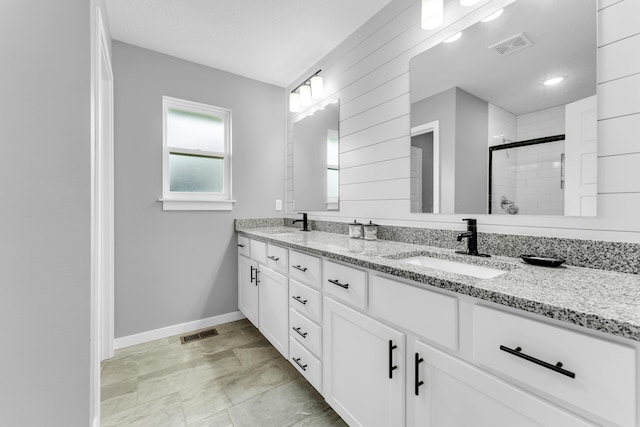 1682 Vicksburg Psge, Republic, MO 65738 - bathroom featuring double vanity, a shower stall, and baseboards