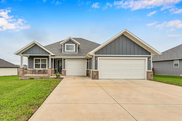 1682 Vicksburg Psge, Republic, MO 65738 - craftsman house with a front lawn, brick siding, a garage, roof with shingles, and driveway