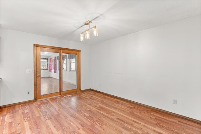 1007 Bryce Ln, Nixa, MO 65714 - unfurnished room featuring light wood-type flooring and baseboards