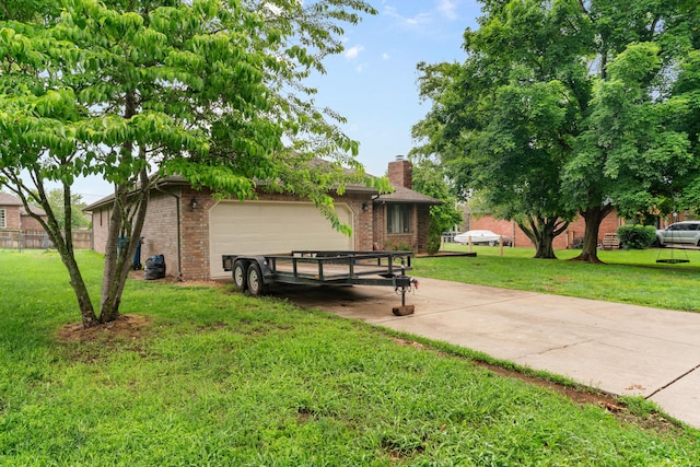 1007 Bryce Ln, Nixa, MO 65714 - view of side of property with a chimney, brick siding, driveway, and a garage