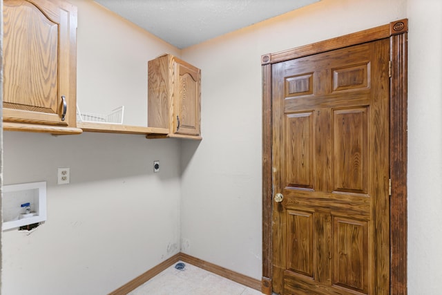1007 Bryce Ln, Nixa, MO 65714 - laundry room featuring washer hookup, cabinet space, hookup for an electric dryer, and baseboards
