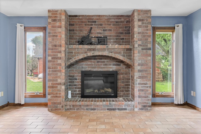 1007 Bryce Ln, Nixa, MO 65714 - detailed view of baseboards and a fireplace