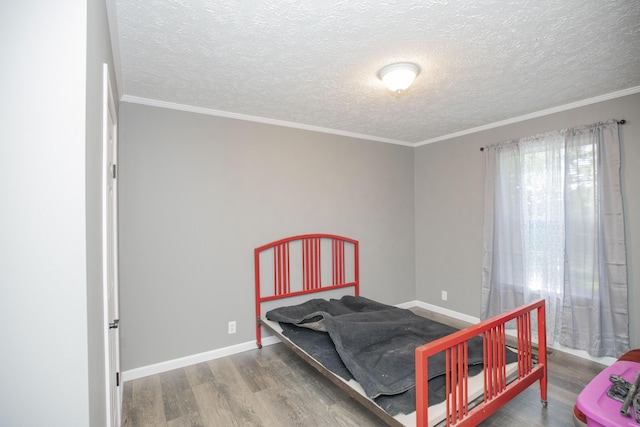 4857 S 101st Rd, Bolivar, MO 65613 - bedroom featuring wood finished floors, a textured ceiling, baseboards, and ornamental molding