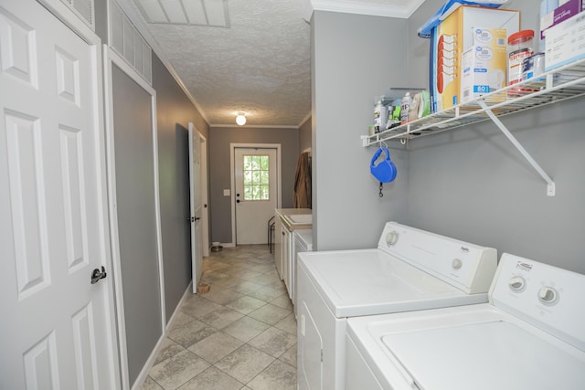 4857 S 101st Rd, Bolivar, MO 65613 - washroom with ornamental molding, a textured ceiling, washer and clothes dryer, and baseboards