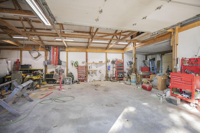 4857 S 101st Rd, Bolivar, MO 65613 - garage featuring a workshop area