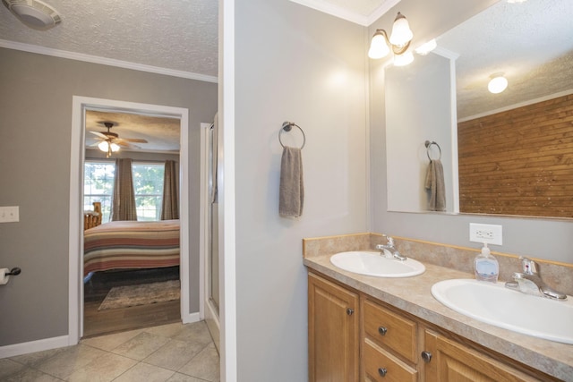 4857 S 101st Rd, Bolivar, MO 65613 - ensuite bathroom with a textured ceiling, double vanity, tile patterned flooring, baseboards, and an enclosed shower