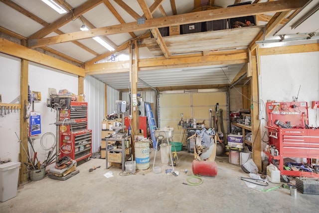 4857 S 101st Rd, Bolivar, MO 65613 - garage featuring a workshop area