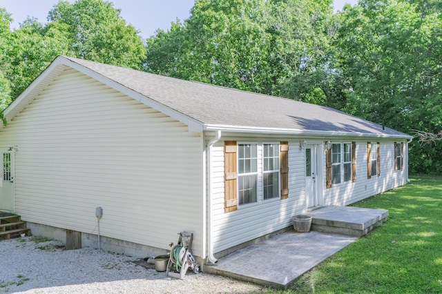 4857 S 101st Rd, Bolivar, MO 65613 - view of property exterior with a lawn and roof with shingles