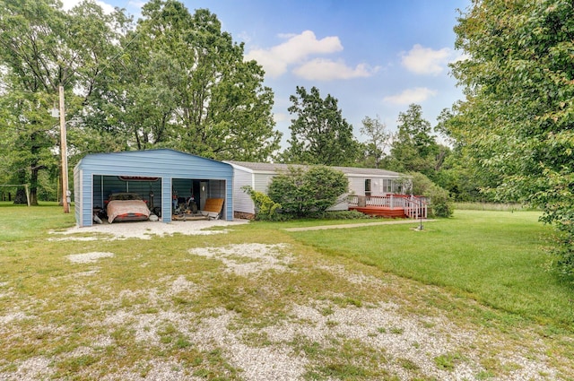 223 Harvest Dr, Rogersville, MO 65742 - view of green lawn featuring a wooden deck, a detached carport, and view of scattered trees