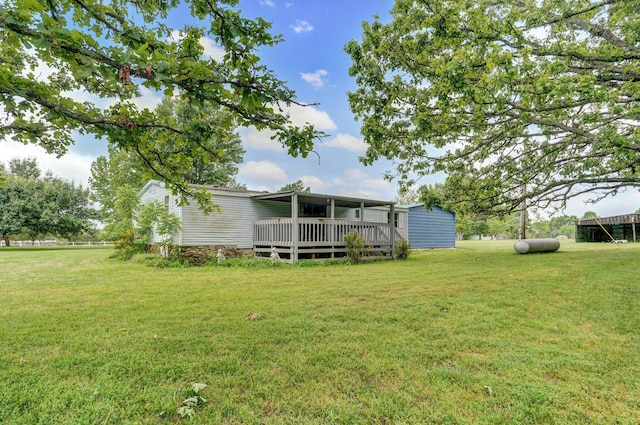 223 Harvest Dr, Rogersville, MO 65742 - view of green lawn with a wooden deck