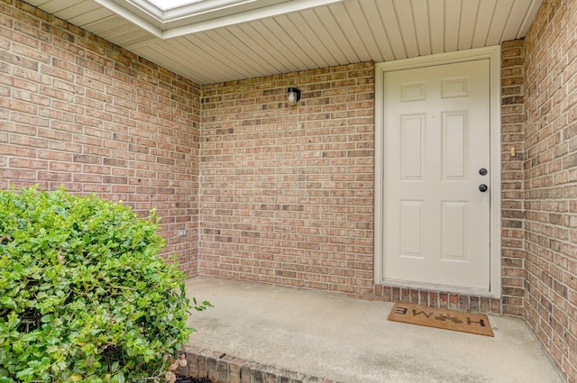 511 W Chestnut Rd, Nixa, MO 65714 - property entrance with brick siding