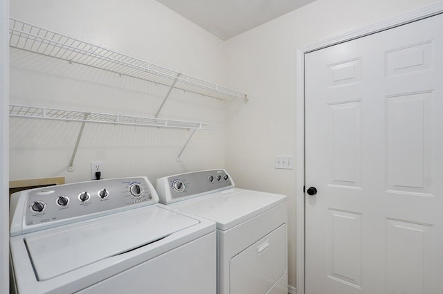 511 W Chestnut Rd, Nixa, MO 65714 - laundry room featuring washer and clothes dryer