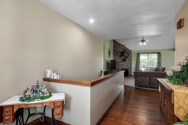 7519 W Farm Rd Unit 194, Republic, MO 65738 - hallway with lofted ceiling, dark wood-style flooring, and baseboards