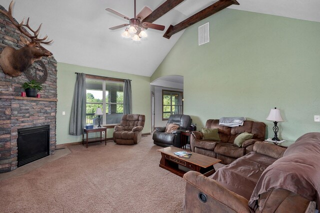 7519 W Farm Rd Unit 194, Republic, MO 65738 - carpeted living area with a ceiling fan, beam ceiling, high vaulted ceiling, arched walkways, and a fireplace