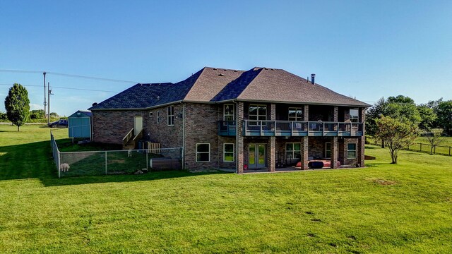 7519 W Farm Rd Unit 194, Republic, MO 65738 - rear view of property with brick siding, a shingled roof, a wooden deck, french doors, and a patio area