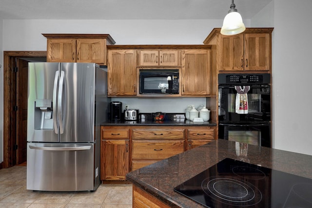 7519 W Farm Rd Unit 194, Republic, MO 65738 - kitchen with black appliances, brown cabinetry, dark stone counters, and light tile patterned flooring