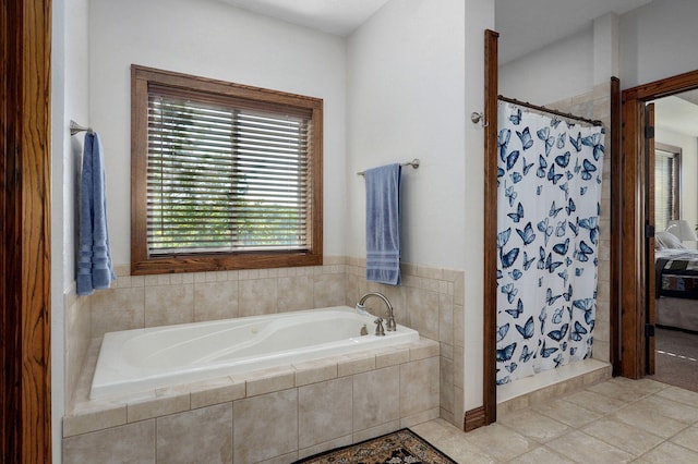 7519 W Farm Rd Unit 194, Republic, MO 65738 - full bathroom with a stall shower, tile patterned flooring, and a garden tub