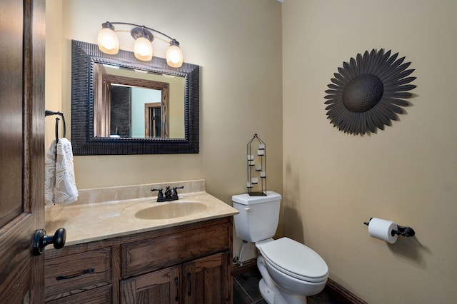 7519 W Farm Rd Unit 194, Republic, MO 65738 - bathroom featuring vanity, toilet, baseboards, and tile patterned floors