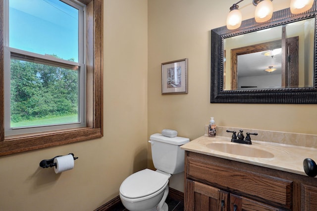 7519 W Farm Rd Unit 194, Republic, MO 65738 - half bathroom with toilet, vanity, and baseboards