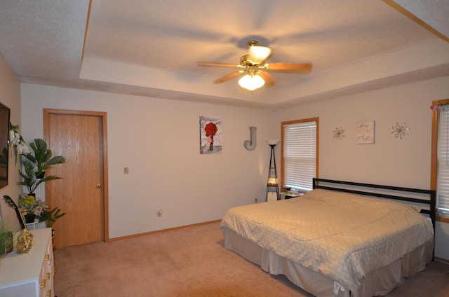 425 S Sherwood Ave, Republic, MO 65738 - bedroom with a raised ceiling, light colored carpet, baseboards, and a ceiling fan