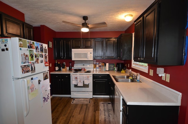 425 S Sherwood Ave, Republic, MO 65738 - kitchen featuring white appliances, a sink, light countertops, a textured ceiling, and dark wood-style flooring