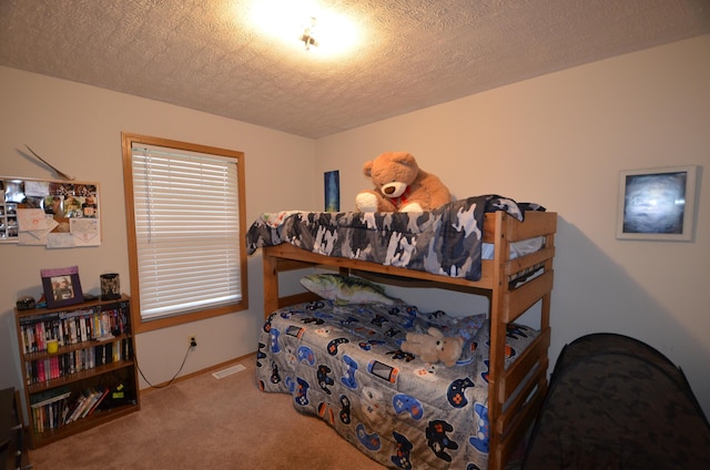425 S Sherwood Ave, Republic, MO 65738 - carpeted bedroom with a textured ceiling