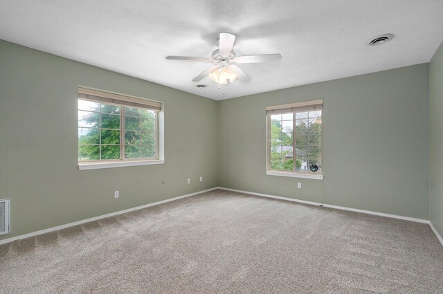 382 S Yellowwood Dr, Springfield, MO 65809 - carpeted spare room featuring healthy amount of natural light, baseboards, and ceiling fan