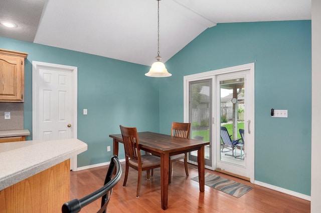 382 S Yellowwood Dr, Springfield, MO 65809 - dining room with vaulted ceiling, light wood-style flooring, and baseboards