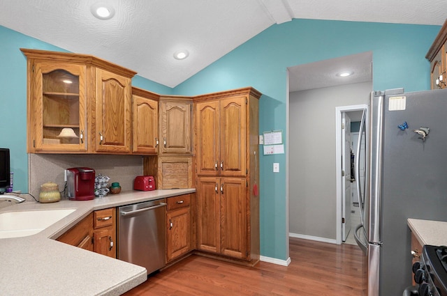 382 S Yellowwood Dr, Springfield, MO 65809 - kitchen featuring stainless steel appliances, a sink, wood finished floors, light countertops, and recessed lighting