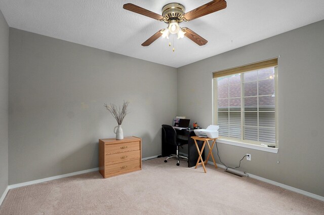 382 S Yellowwood Dr, Springfield, MO 65809 - home office with light carpet, a ceiling fan, and baseboards