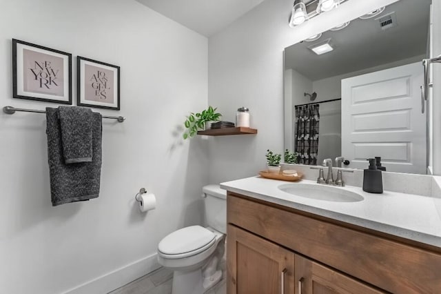 1108 W Pebblebrooke Dr, Ozark, MO 65721 - bathroom featuring vanity, toilet, a shower with curtain, and baseboards