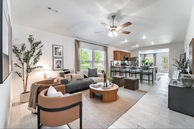 1108 W Pebblebrooke Dr, Ozark, MO 65721 - living room with ceiling fan, healthy amount of natural light, lofted ceiling, and light wood-type flooring